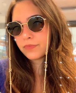 Solglasögon av högkvalitativ kvinnors klassiska titanlegeringsram varumärkesdesigner med kedja
