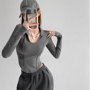 Bluzki damskie koszule 2023 Wiosna Kobiety lrregularne krótkie tshirtvneck szczupły y2k lady soft harajuku tee longsleeve ubrania amerykański styl vintage 230223