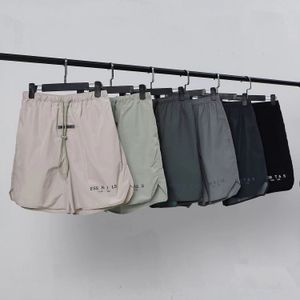 Shorts FOG de alta qualidade de náilon masculino e feminino streetwear shorts reflexivos soltos com cordão na altura do joelho