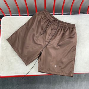 23ss Verão Europa Praia Shorts Mulheres Homens Bordados Patchwork Nylon Calças Médias Jogging Bottoms Curtos