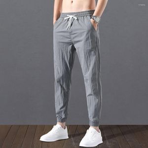 Pantaloni da uomo da jogging Polsini termoretraibili Uomini che toccano la pelle Fodera in peluche invernale Coulisse Sport Pantaloni sportivi casual morbidi per lavoro