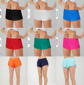 Frauen Sommer Yoga Hotty Hot Shorts atmungsaktiv schnell trockener Sportunterw￤sche Frauen Taschenl￤ufe Fitnesshosen Prinzessin Sportswear Fitnessstudio Lululemens Lululemens