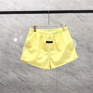 23SS Summer Europe Beach Shorts Women Men Men Fridroded Logo Nylon Pants Midle