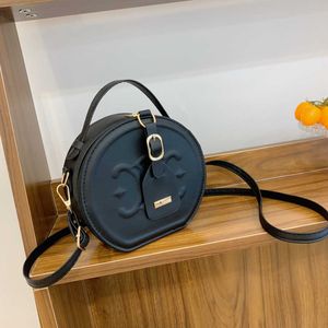 80% 2023 High quality luxury for women new texture portable small popular messenger round cake bagHigh quality