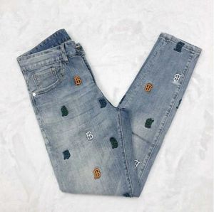 Nya mäns jeans vita tygdesigner byxor broderade byxor män och kvinnor förlorar casual jeans