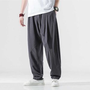 Calça masculina de cinto elástico de homens de harém casual calças esportivas soltas calças de corrida de estilo harajuku masculino de moda de cor de hip hop z0225