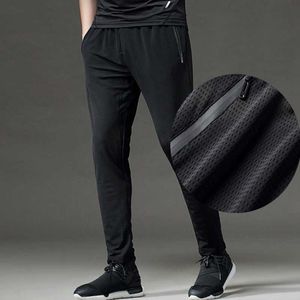 Pantaloni da uomo Pantaloni sportivi da fitness con foro in rete di alta qualità Pantaloni sportivi da uomo elastici e traspiranti Pantaloni da allenamento da corsa Pantaloni da basket da palestra Z0225