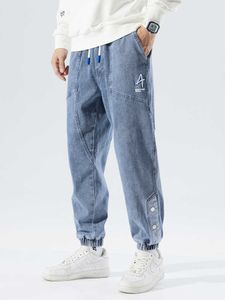 Męskie dżinsy wiosenne jesień plus luźne dżinsy męskie Mężczyznę Hip Hop Streetwear Harem Spods Fashion Hafdery Stretch Cotton Casual Jogger Dżinsy 8xl Z0225