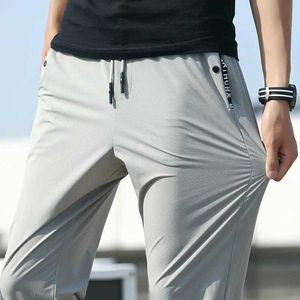 Calça masculina verão novo 2023 Harém de harém masculino Slim Fit Fit confortável calça elástica de alta qualidade cor preta cinza plus size 5xl 6xl 7xl 8xl z0225