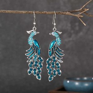 Brincos de pavões étnicos de strass azuis de charme Brincos de pavões de pavões indianos cor de cristal de cor de prata vintage para mulheres pendientes G230225