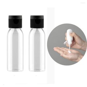 Garrafas de armazenamento freeShip 20pcs 20ml Plástico garrafa de viagem vazia com lampe de recipientes de amostra de tampa para lotes xampus e óleos de massagem