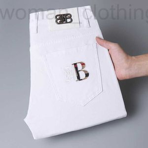 Herren Jeans Designer 2023 Frühling und Sommer Jeans Herren leichte Luxus koreanische Version dünne elastische schlanke Baumwolle reine weiße Hose PZBN