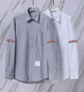 Camicia a maniche lunghe a righe casual da uomo 2023 nuova camicia comoda primavera ed estate dal design leggero del marchio di lusso