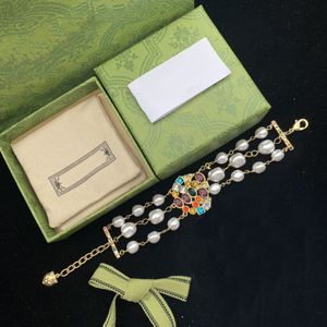 Brazalete de brazalete de brazalete de diamantes para mujer planta de regalo brazalete de cadena larga suministro de joyas de moda de latón