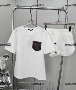 Trailtsuits Kadın Sportswear Lady Sıradan Kıyafet 2 PCS Deri Cep T-Shirt ve Kiracı Şort Yaz Açık Boyut S-L Yeni Gelişler Şubat25