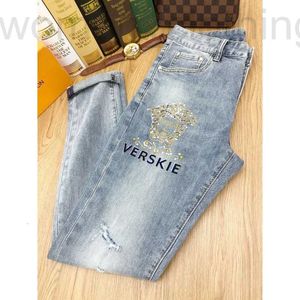 Men's Jeans Designer Hot drill jeans for young men with holes elastic slim fit small feet summer thin new fashion pants C465