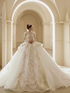 2023 Arabo Vintage una linea Abiti da sposa Cristalli Sheer Manica lunga Pizzo Perline Ball Gown vestido de novia Abito da sposa Dubai Luxury Robes De Mariee