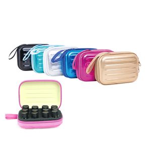 Bolsas de armazenamento As novas 12 grades portáteis de óleo de armazenamento de óleo essencial para bola de preto cosmético Macaron multifuncional Macaron Carry TOUR A PACKE Y2302