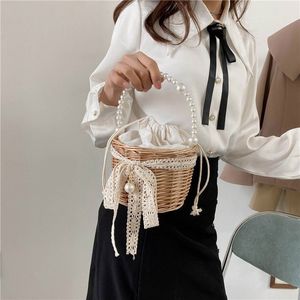 summer new woven pearl handbag sweet basket bag women can not shoulder Messenger foreign trade women's bag