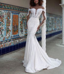 Sexy Mermaid Wedding Dresses Long Sleeves Deep V Neck Lace Pearls Appliques Sequins Beaded Floor Length Diamonds 3D Lace Pearl Elegant Bridal Gowns abiti da sposa
