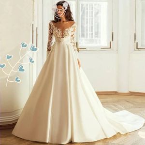 2023 Simple New Satin A Line Wedding Dresses With Elegant O Neck Lace Applique Long Sleeves golvlängd Brudklänningar Brudklänning billig anpassad