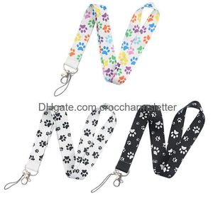 Ciondoli per cellulare Ciondoli Parti di scarpe Accessori Lb2234 Cartoon Dog Paw Print Portachiavi Cordino per chiave Fotocamera Fischio Id Badge Hold Otybs