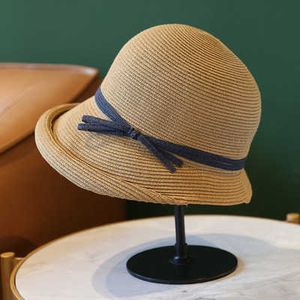 Szerokie brzegowe czapki Summer Solbeble Straw Hat Ladies UV Sun Hat Hat Casual Temperament Moda Prosta dzika elegancka oddychanie Hats G230227