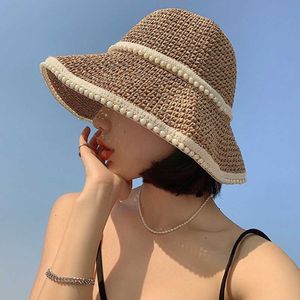 Широкие шляпы складывания жемчужной соломенной шляпы женская летняя подъема солнца праздничный прохладный шляпа приморский пляжный шляпа Tide Женский панамский шляпы G230227