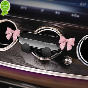 Ny söt Bowknot Universal Car Phone Holder Cartoon Diamond GPS Stand Gravity Bracket Auto Air Vent Clip Mount Mobile Holder