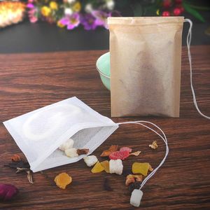 100pcs/lotルーズリーフフィルターバッグコーヒーツールお茶の木の色のための自然な空の空の紙注入剤ストレーナー