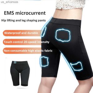 Ny Intelligent Fitness Machine EMS Muscle Stimulator skinkben Korta byxor för män och kvinnor Träning Fitness Siliming Pants L230523