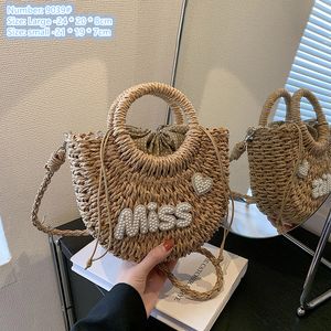 wholesale ladies shoulder bags 2 colors retro straw semi-shell handbag outdoor leisure seaside holiday beach bag sweet pearl embellished woven handbags 9039#