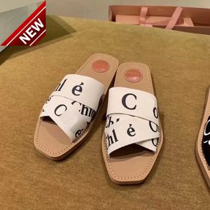 2023 Kadınlar Woody Katır Terlik Tasarımcı Tuval Çapraz Dokuma Sandalet Yaz Açık Gözet Peep Toe Sıradan Terlik Mektubu Stilist