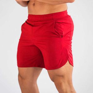 Muscleguys desek seksowne plażowe bermudy noszą morską siłownię Szybki suchy jogger sportowe spodenki p230602