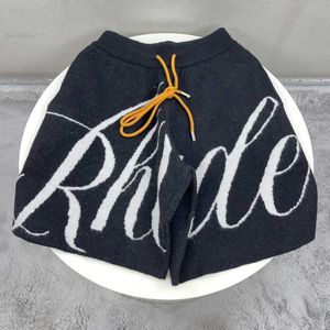 Designerkläder 2023 Summer Trend Brand High Street Rhude Letter Jacquard Drawstring Knittad Woolen Casual Shorts Capris Couples Joggers Sportwear