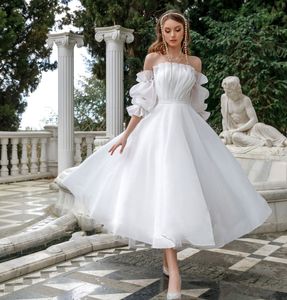 Princess Organza Wedding Dresses 2023 Garden Strapless Lossible Sleeve Robe de Mariage Bridal Gown Tea Längd Vestido de Noiva