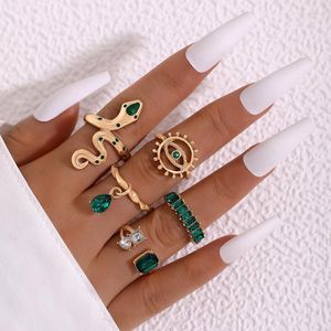 Tornozeleiras em forma de cobra com olho de sol pedra verde incrustada anel com estilo europeu e americano joias de mão feminina cinco peças