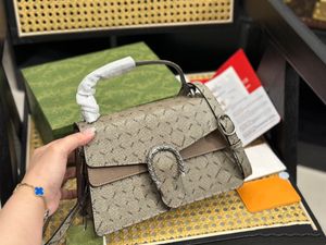 Moda klasik bacchus omuz çantası deri tuval zincir çantası klasik kadın postacı çanta lüks metal logo büyük kapasiteli kanat çantası kimliği michafl_kops