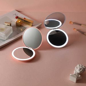 Инструменты для макияжа персонализированный маленький светодиодный светодиод Косметика 2 бокового складного макияжа Компактное карманное зеркало Женщины светящиеся эффекты Розовое белое мини -зеркало J230601