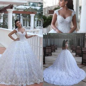 2019 Luxury Ball Gown Illusion Back Wedding Dresses Said Mahamaid Sweetheart Cap ärmar Arabiska pärlspetsapplikationer Novia Bridal148q