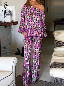 Dwuczęściowe spodnie kobiety Polka Dot nadruk dwuczęściowy zestaw seksowny jedno ramię w bluzce z długim rękawem luźne spodnie Suits Kobiet Spring Casual Streetwear Suit 230603
