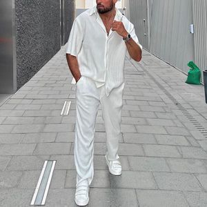 Pantaloni da uomo Completi lunghi 2023 Manica Casual Due pezzi Set Bottoni larghi Uomo Camicia estiva semplice corta Completo da ufficio con risvolto solido 230603