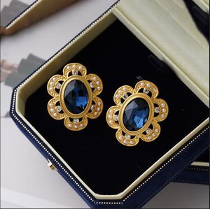 Retro ear studs women's medieval sunflower fashionable temperament new pearl earrings E385