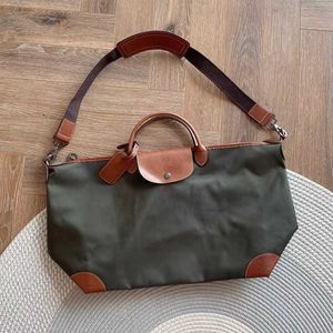 Designer handväska longchammps resväska hög version cowhide med krypterad nylon stor dumpling väska för män och kvinnor resväska stor kapacitet hand bagagepåse