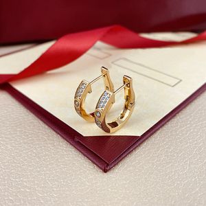 Kolczyki ze stali nierdzewnej Projektanci biżuterii Chunky Gold Designer Wedding Luxury Jewelry Full Diamond Białe złoto Kryształowy Ohringe Big Hoop Studeusz