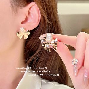 Luxury Designer's Brilliant Radiance Geometric Knot Gem Earrings Designer Plated 18K Gold Butterfly Tassel Zircon Earring Clip