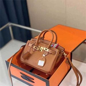 Hög handväskor 2024 Platinum mångsidig designer Sense Family Portable Real Leather Lychee Mönster Stor kapacitet Fashion