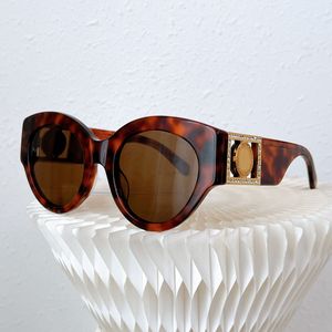 Runda damer solglasögon med lyxguld inlagd kristalllogotypens unika glamorösa storlek 52 22 145 Herr solglasögon lyxdesigner
