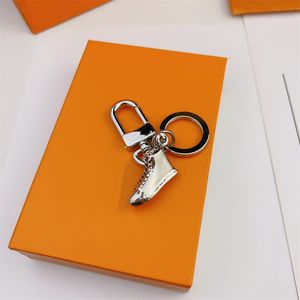 Trendig designer nyckelringskor unisex nyckelkedja prydnad väska charm hänge bokstäver lyxiga nyckelringar biltangentning