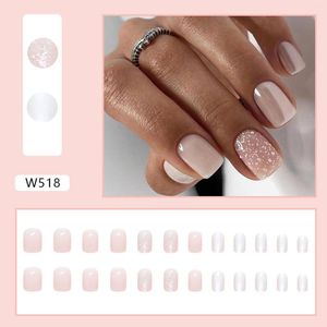 Unghie finte Delicato manicure rosa chiaro con glitter Unghie infrangibili naturali Abbigliamento semplice per abito da ragazza abbinato NIN668